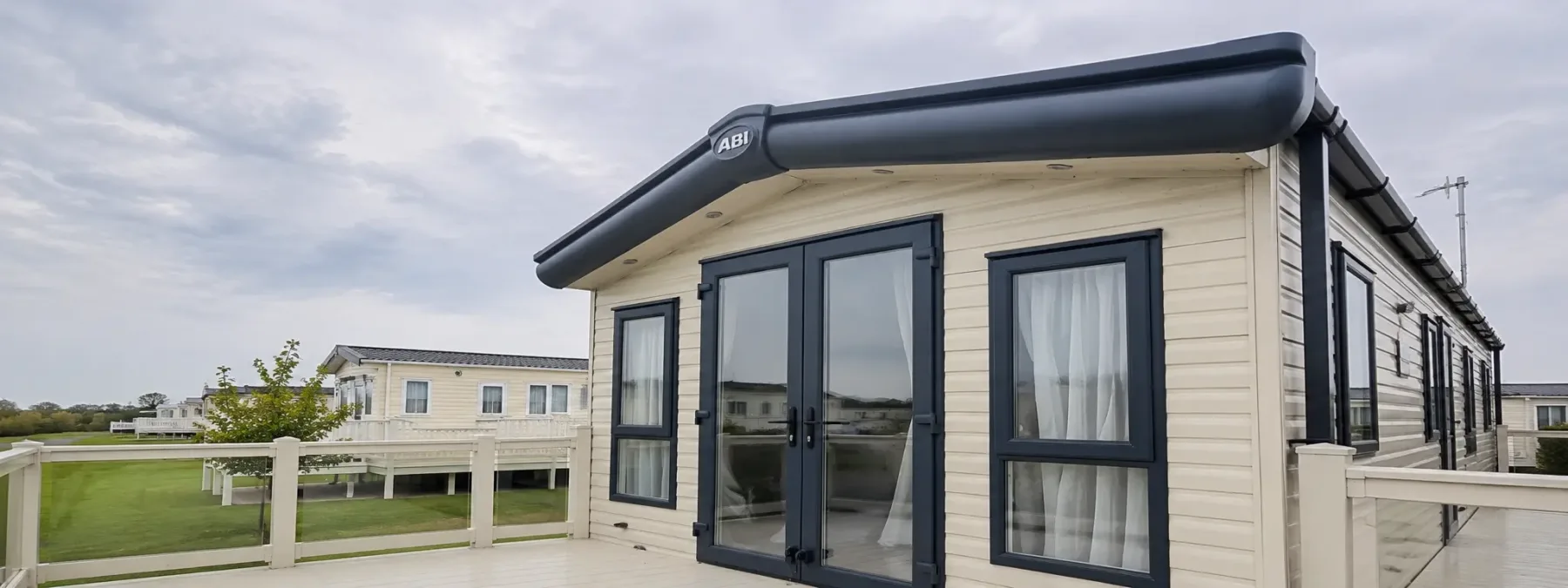 A static caravan resprayed in cream and anthracite by Cutting Edge Spraying